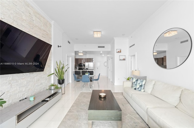 tiled living room featuring crown molding