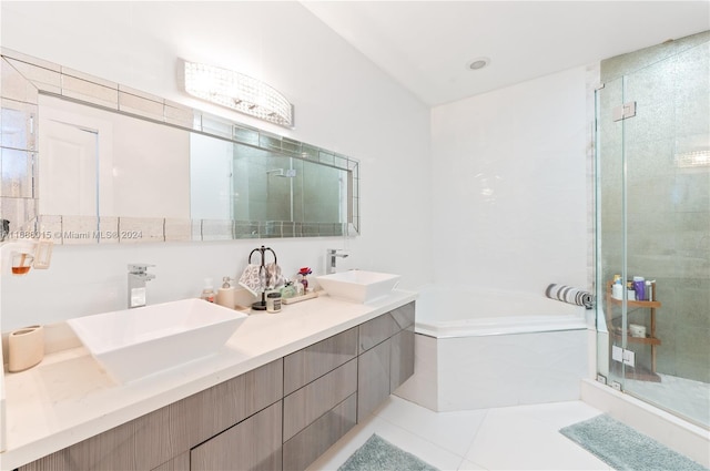 bathroom featuring vanity, tile patterned floors, and shower with separate bathtub