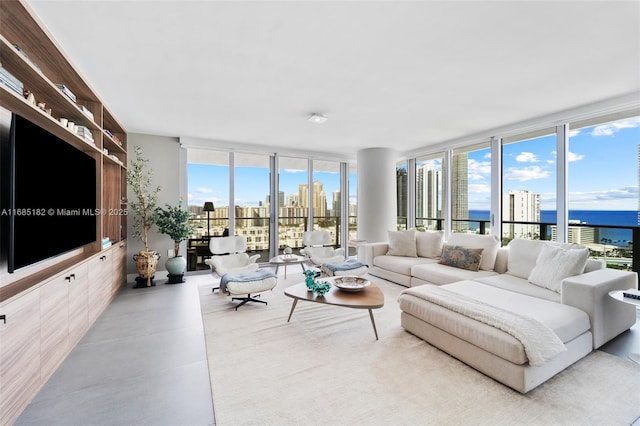 living room with a view of city, floor to ceiling windows, and plenty of natural light