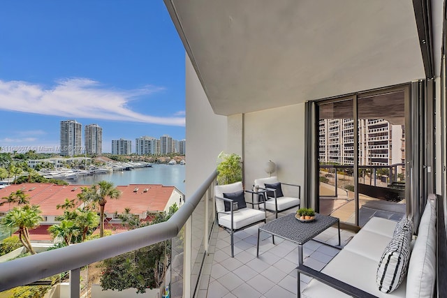 balcony featuring a water view