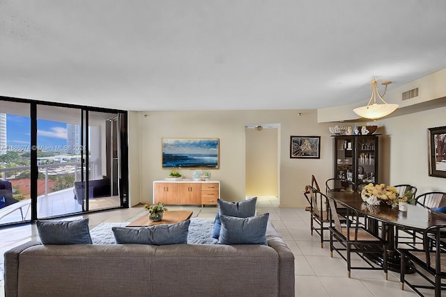 living room with light tile patterned floors