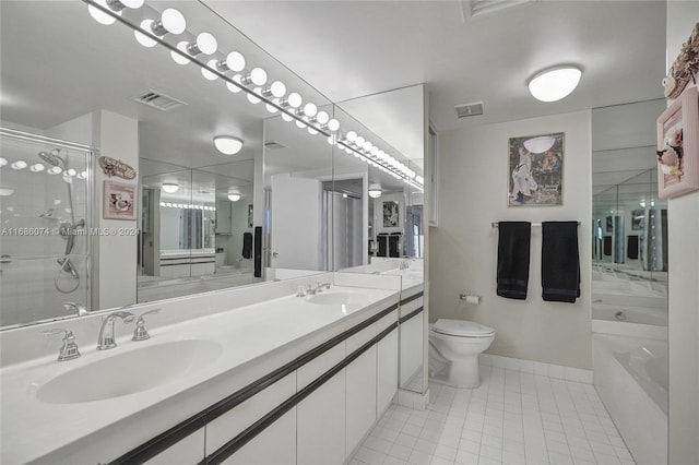 full bathroom with tile patterned flooring, vanity, shower with separate bathtub, and toilet