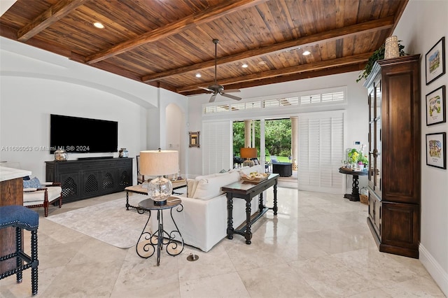 living room with beam ceiling, ceiling fan, and wood ceiling