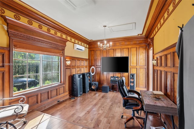 office featuring a wall unit AC, wooden walls, light hardwood / wood-style flooring, and ornamental molding