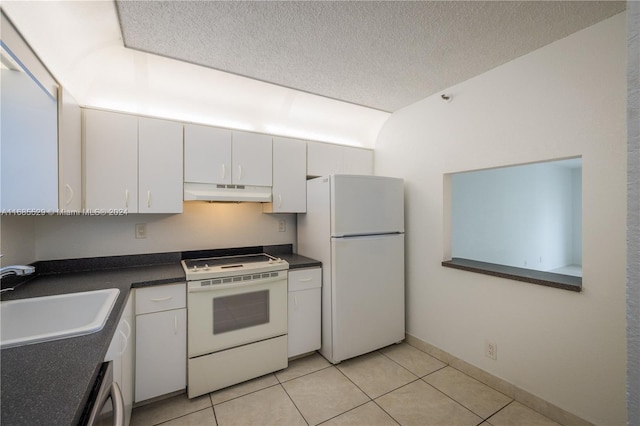 kitchen with white cabinetry, a textured ceiling, light tile patterned floors, sink, and white appliances