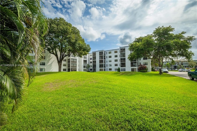 surrounding community with a lawn