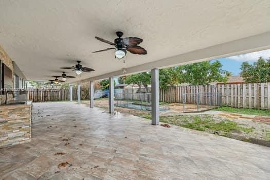 view of patio / terrace with ceiling fan