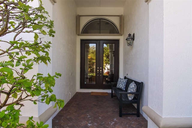 entrance to property featuring french doors