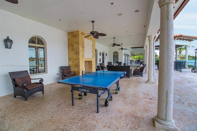 view of patio with ceiling fan