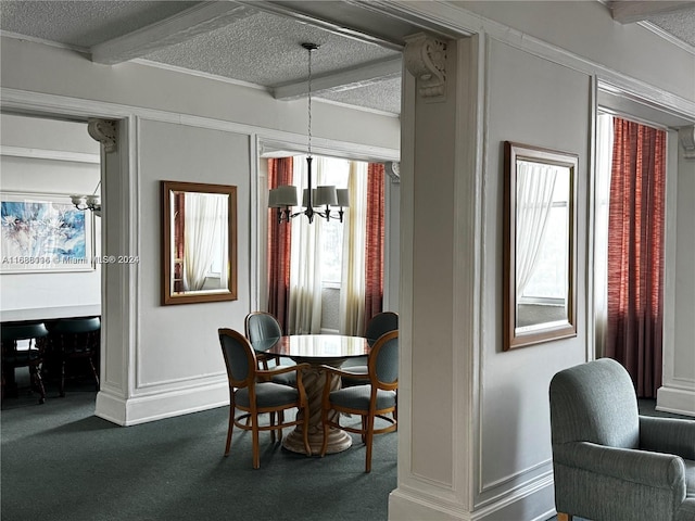 dining room with a textured ceiling, beamed ceiling, a chandelier, and dark colored carpet