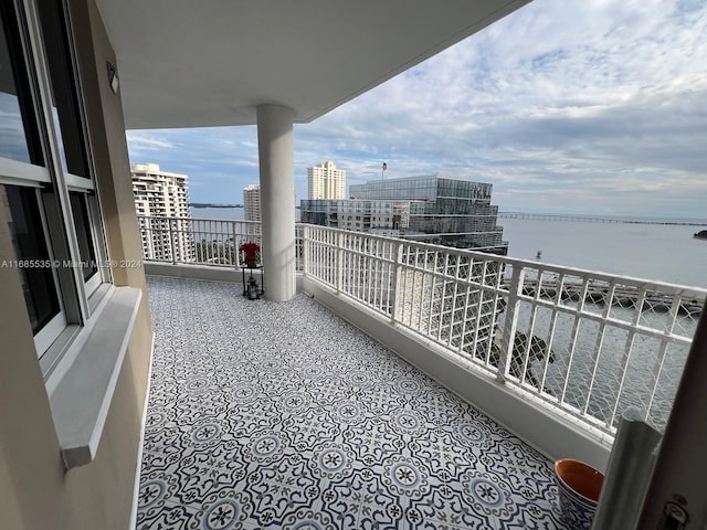 balcony featuring a water view