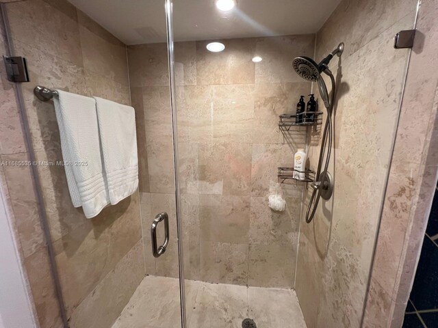 bathroom featuring tile walls, vanity, and toilet