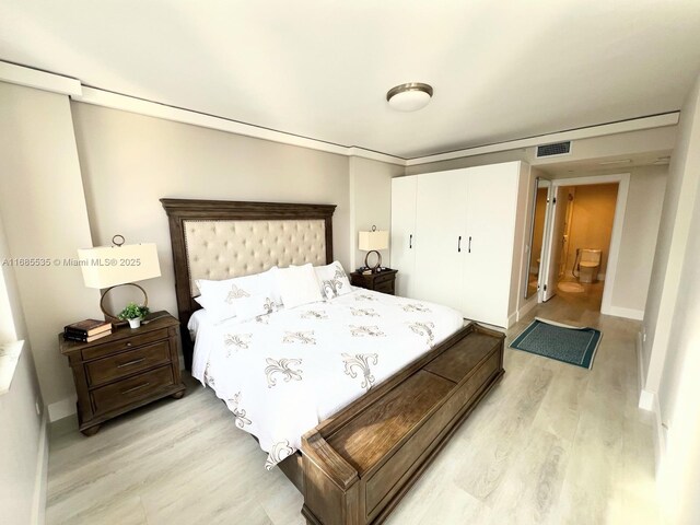 bedroom featuring light hardwood / wood-style floors