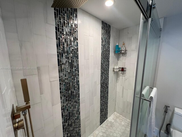 bathroom with an enclosed shower