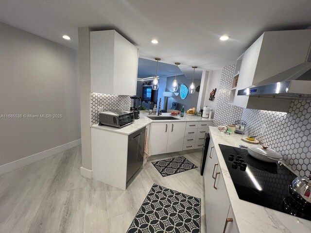 bathroom with wine cooler, decorative backsplash, and sink