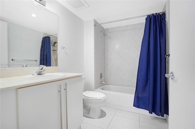 full bathroom with vanity, toilet, shower / tub combo, and tile patterned flooring