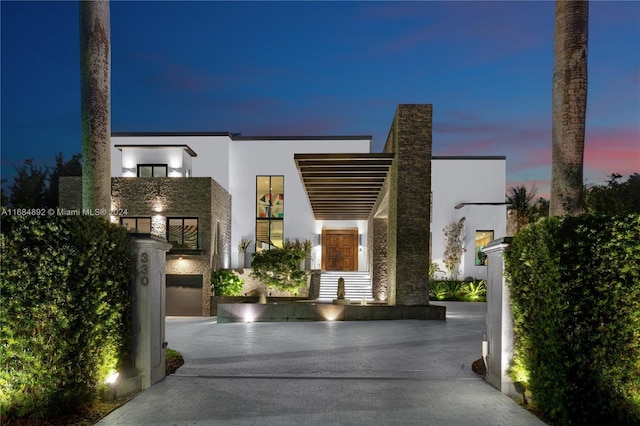 contemporary home with a carport