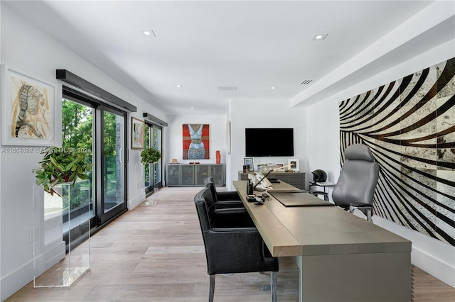 office space featuring light hardwood / wood-style floors