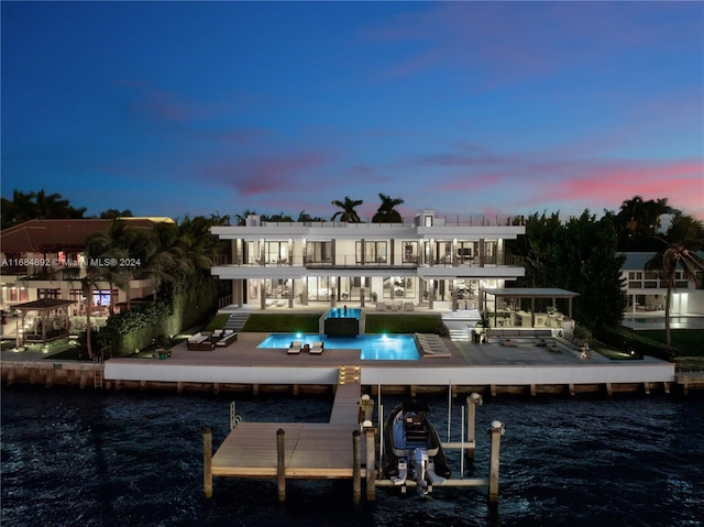 view of dock with a water view