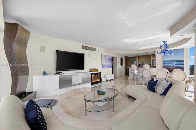 living room featuring an inviting chandelier