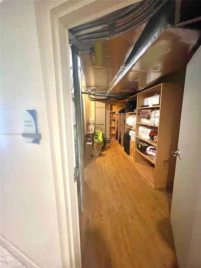 hallway featuring wood-type flooring