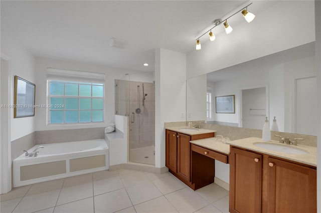 bathroom featuring vanity, tile patterned floors, and shower with separate bathtub