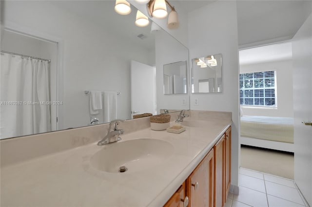 bathroom featuring vanity and tile patterned flooring