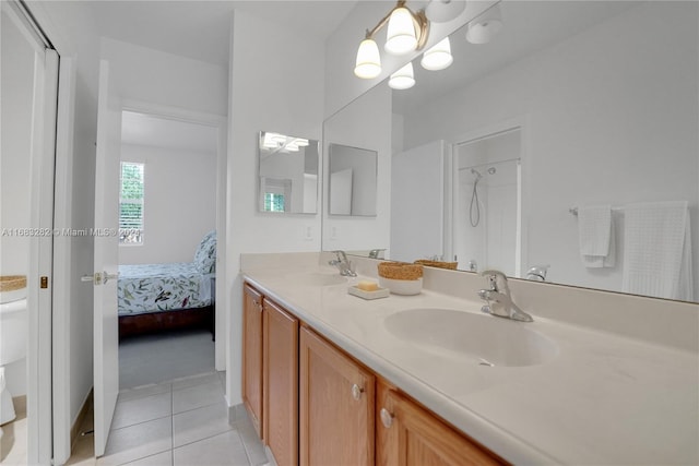 bathroom with vanity and tile patterned flooring