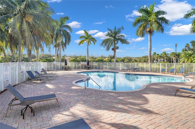 view of swimming pool featuring a patio