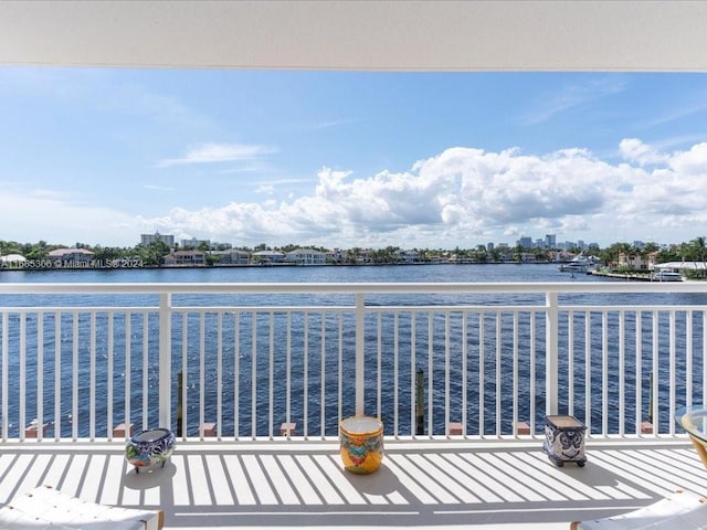 balcony featuring a water view