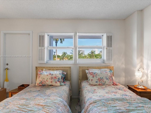 bedroom featuring a textured ceiling