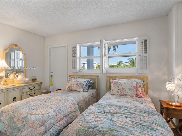 bedroom featuring a textured ceiling