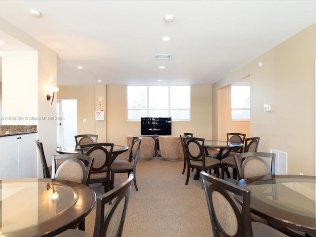 view of carpeted dining space