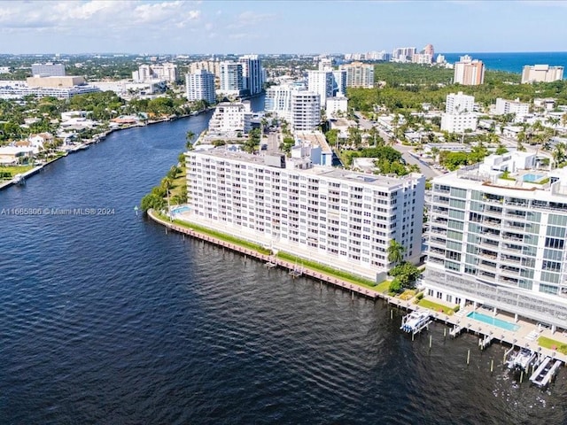 birds eye view of property featuring a water view