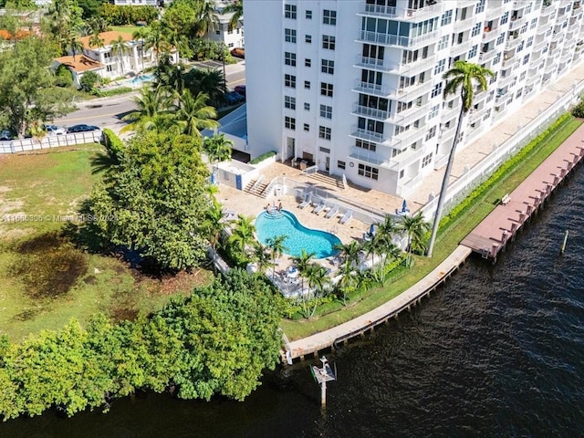 birds eye view of property with a water view