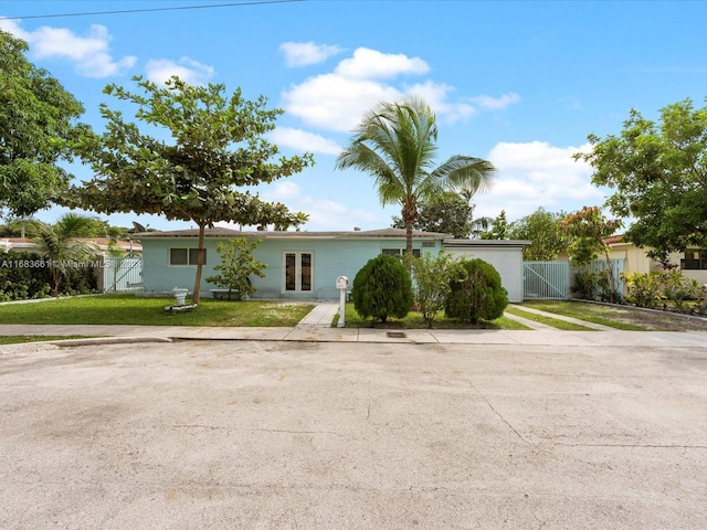 ranch-style house with a front yard