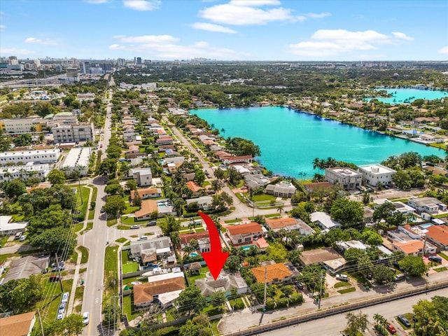 birds eye view of property featuring a water view