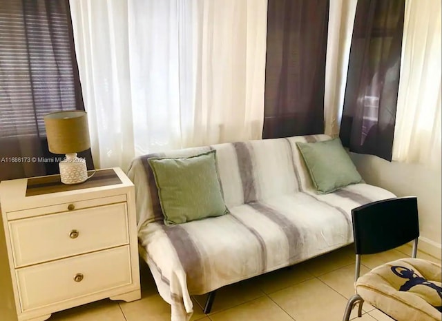 sitting room with light tile patterned floors