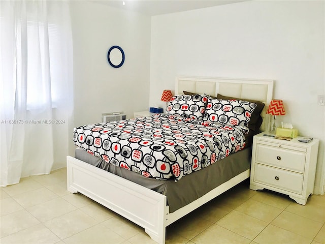 bedroom with light tile patterned flooring