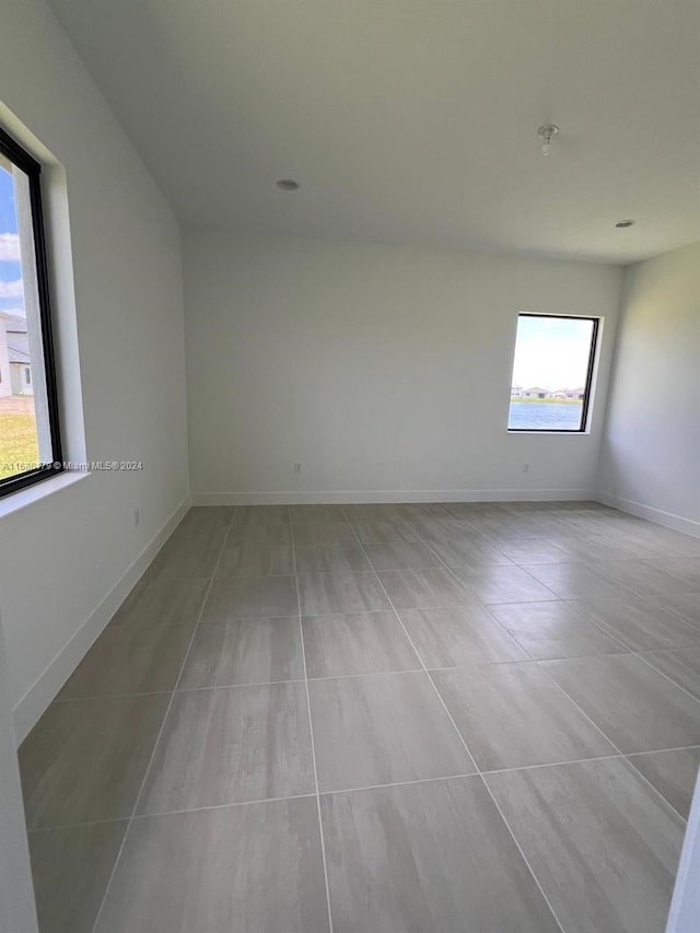 empty room featuring a wealth of natural light