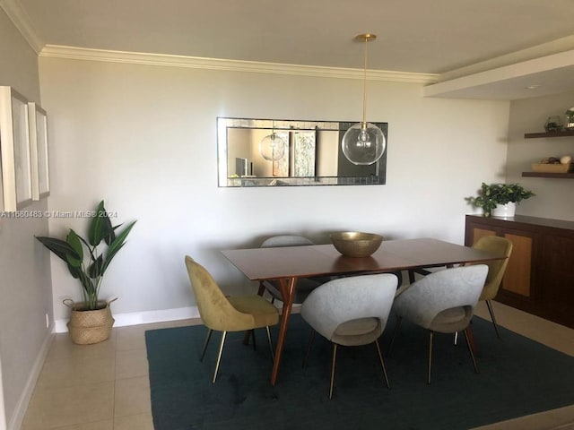 tiled dining room with crown molding