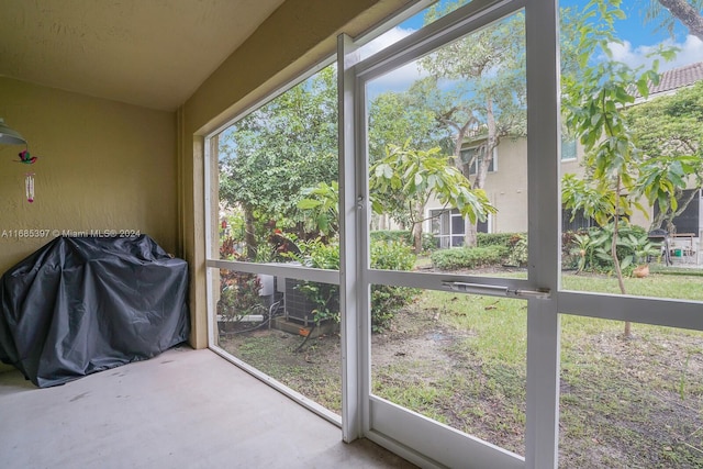 sunroom / solarium with a healthy amount of sunlight