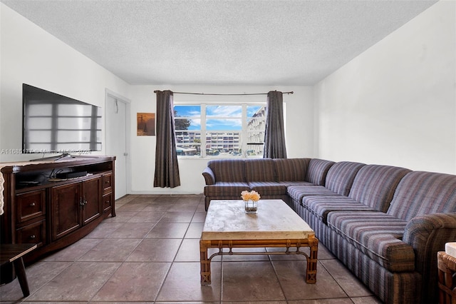 tiled living room with a textured ceiling