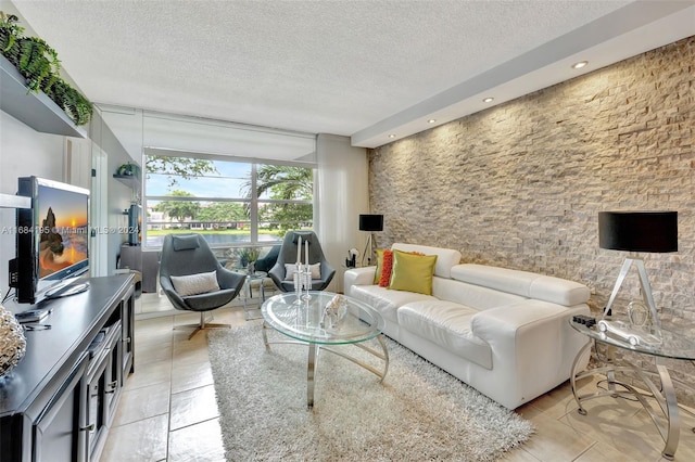 living room with a textured ceiling