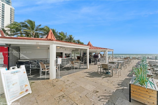 view of patio / terrace featuring a water view