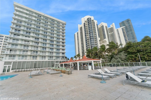 view of property featuring a community pool