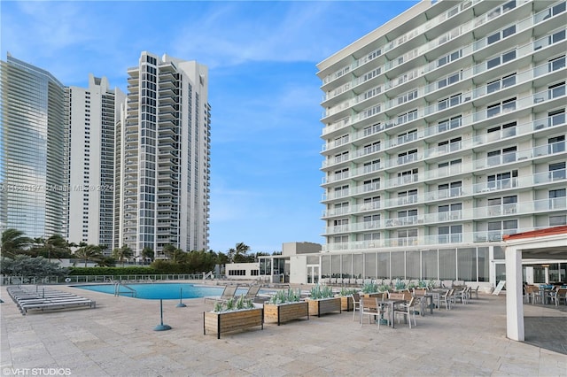 view of pool with a patio