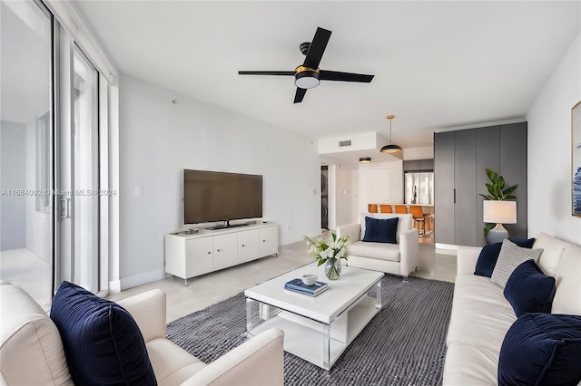 living room with ceiling fan