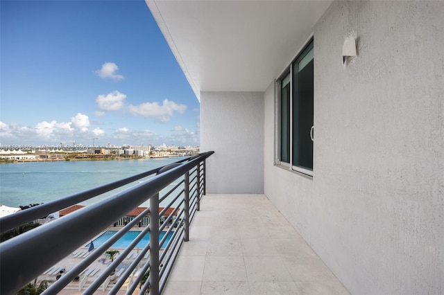 balcony featuring a water view