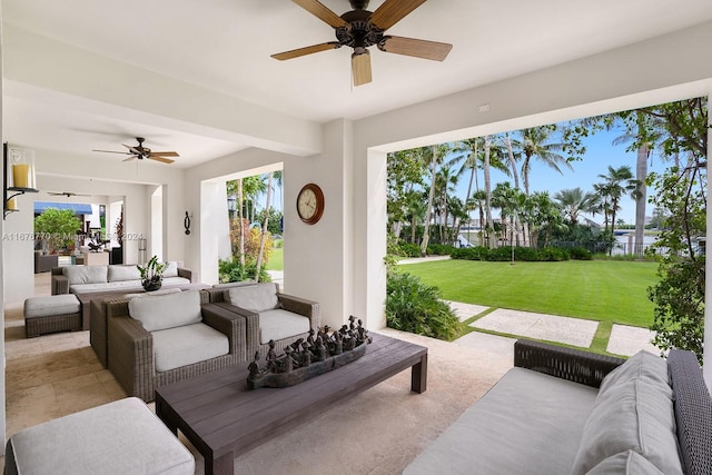 view of patio featuring ceiling fan and outdoor lounge area